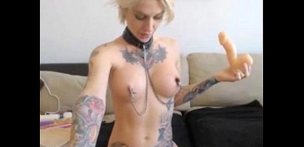  nipple chained tatted blonde girl rams her butt with a ribbed dildo -tinycam.org